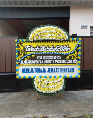 Papan Bunga Duka di Kadoodan